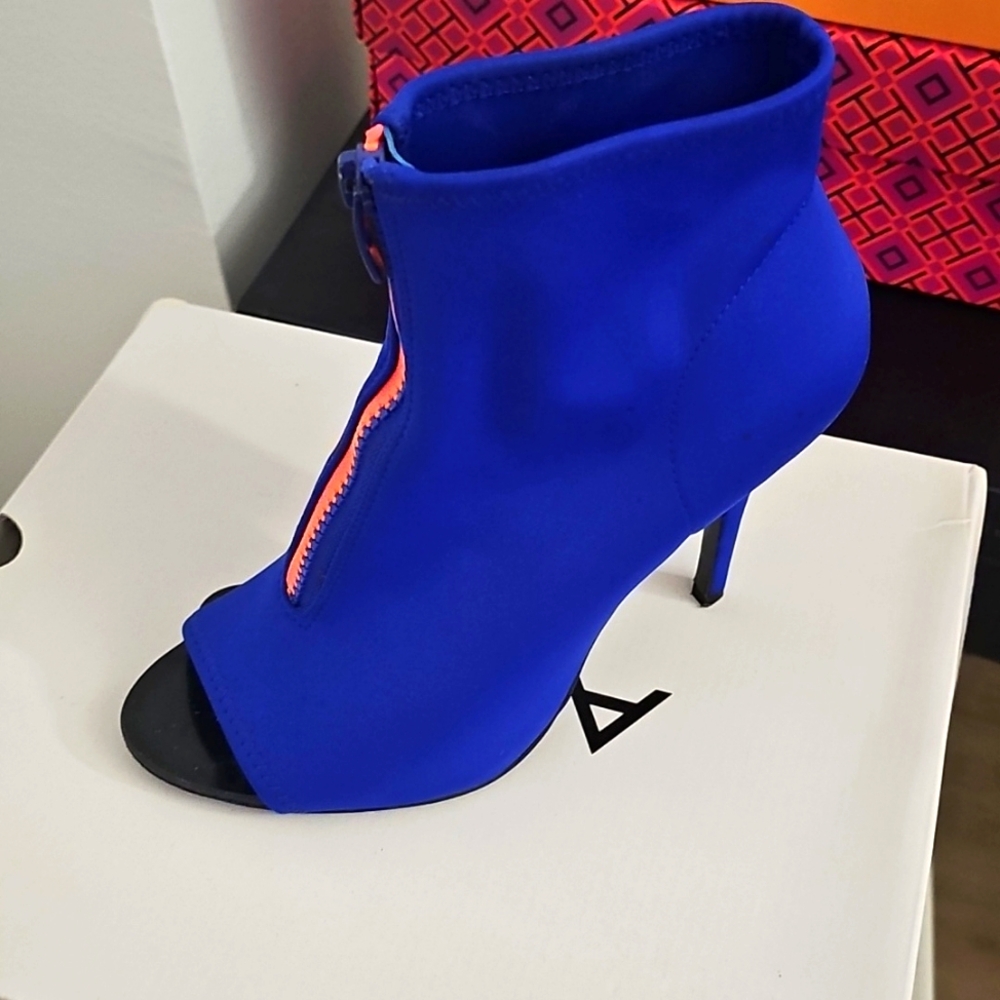These spanx material peep toe booties that are cute ans comfy.